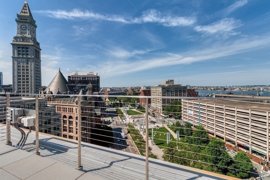 110 Broad Street, Unit 1102 Boston, MA 02110 - Photo 21 of 26 a view of a city with tall buildings