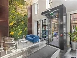 a view of balcony with furniture