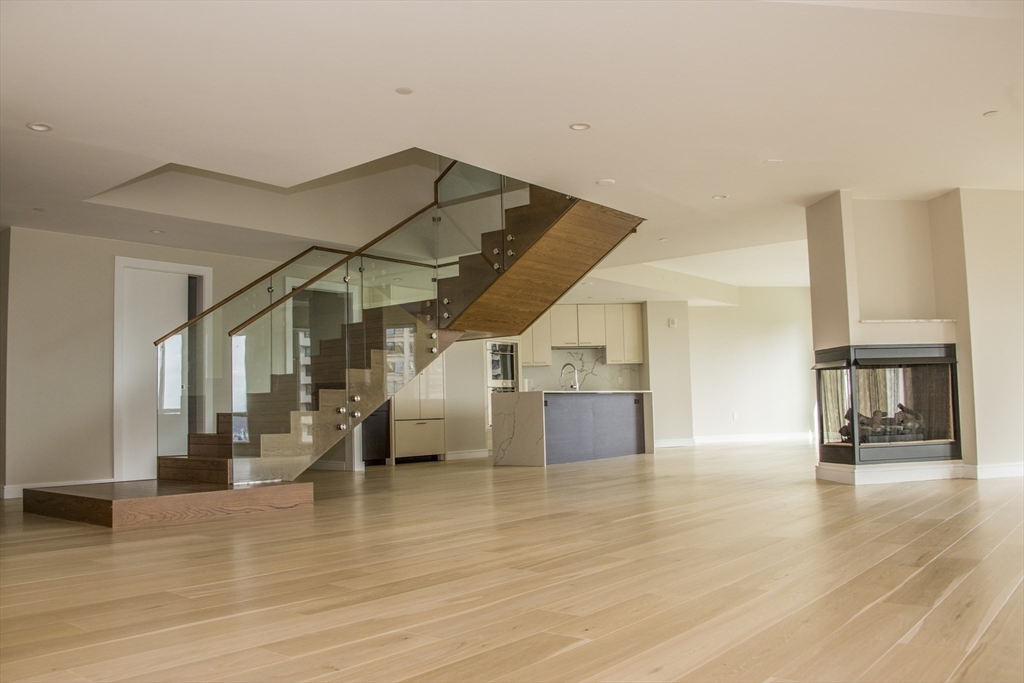 110 Broad Street, Unit 1102 Boston, MA 02110 - Photo 7 of 26 a view of a living room