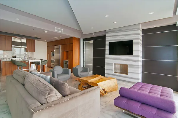 a living room with furniture or fireplace and a flat screen tv