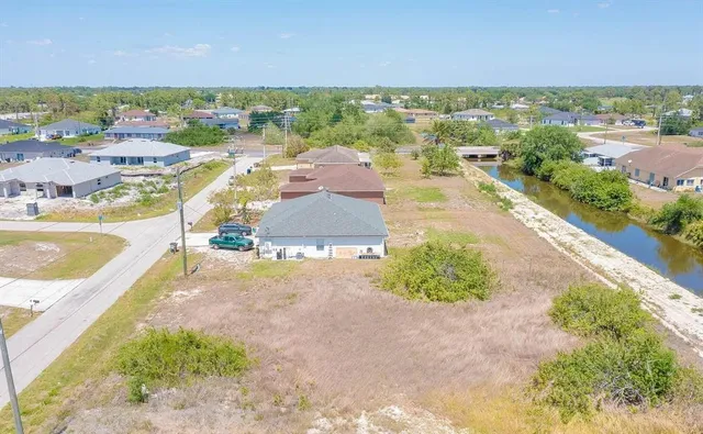 a view of a city with lawn chairs