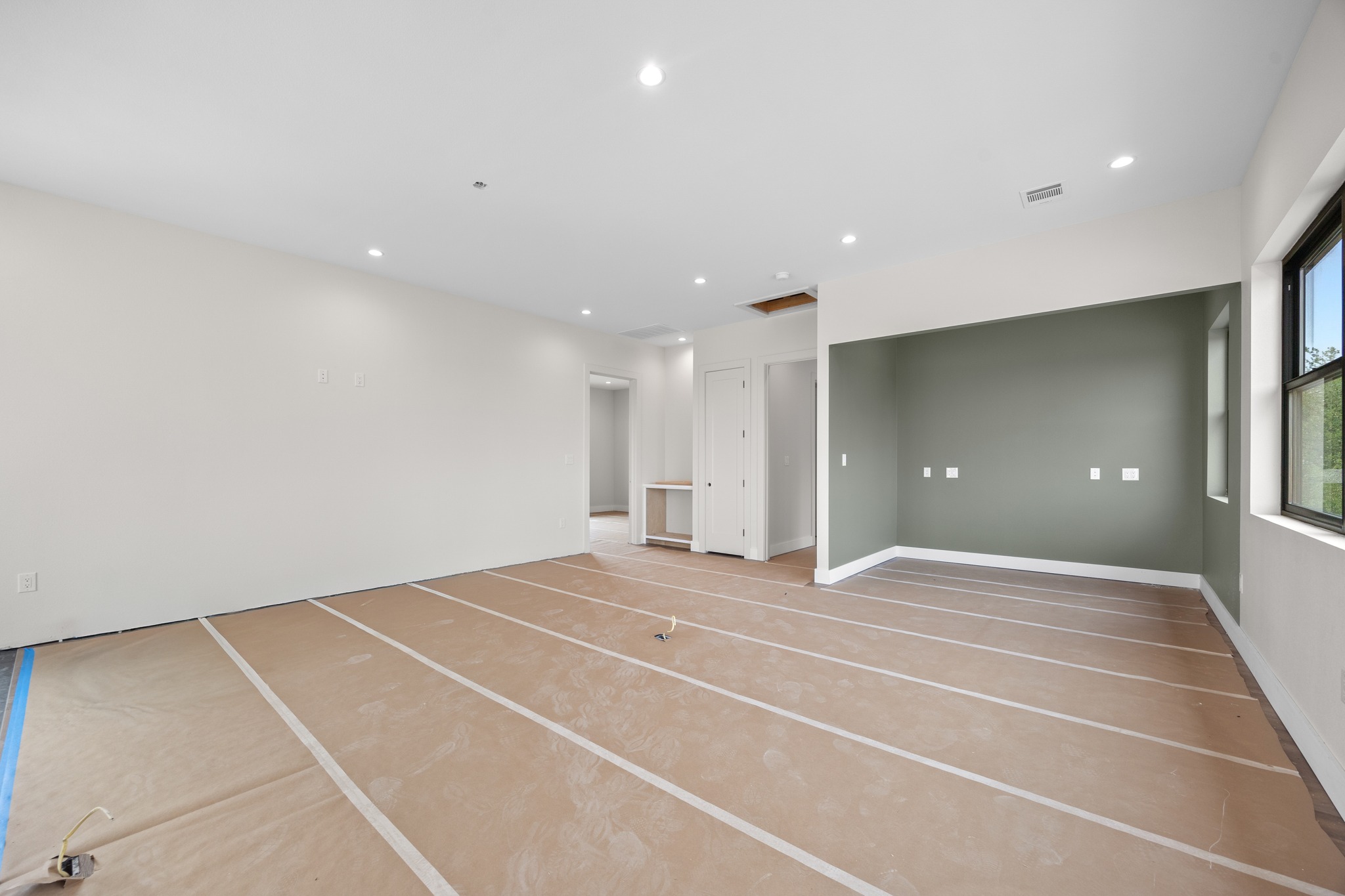 903 Flint Ridge Trail Georgetown, TX 78628 - Photo 26 of 39 Spacious room featuring recessed lighting, a neutral color palette, dark window frames, and ample natural light