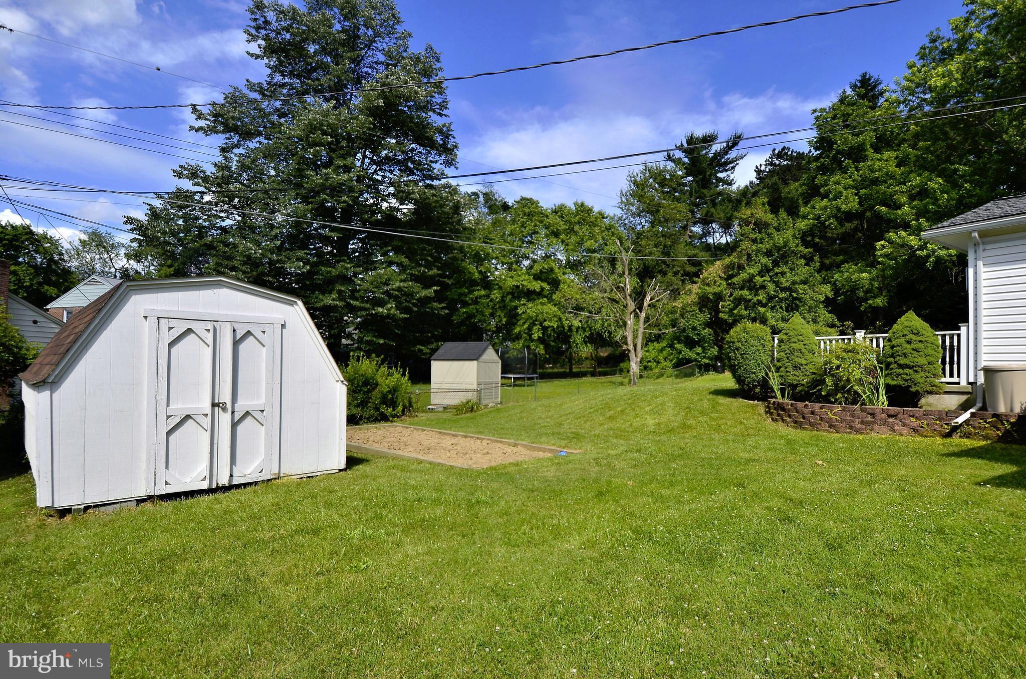 223 Rollingfield Road Catonsville, MD 21228 - Photo 26 of 30 Shed conveys and larger lot size with garden bed!