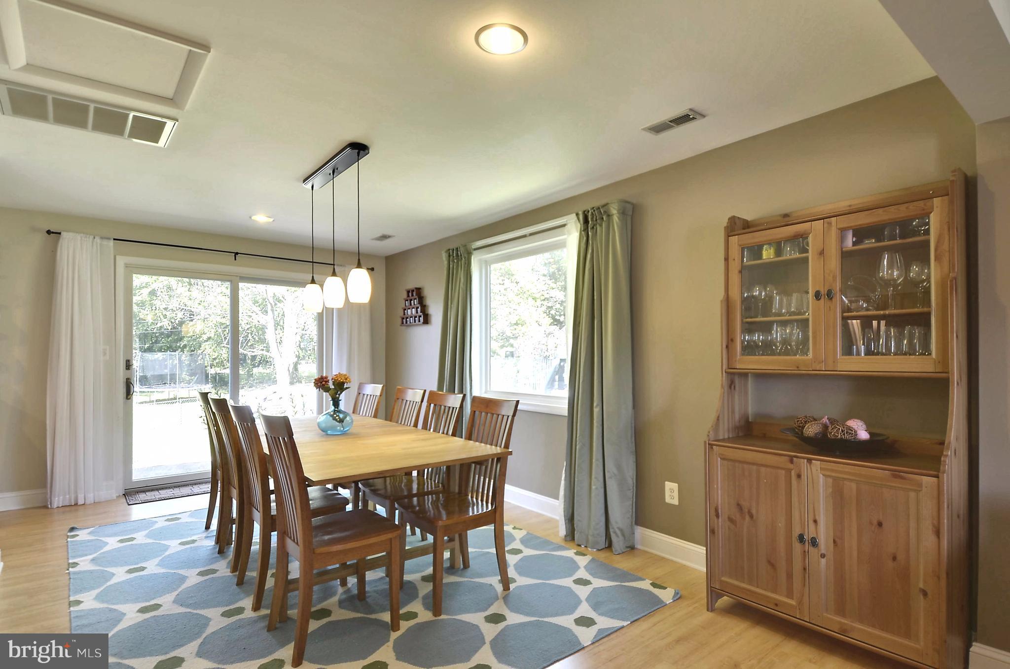 223 Rollingfield Road Catonsville, MD 21228 - Photo 7 of 30 Dining Room with sliding door to back yard patio
