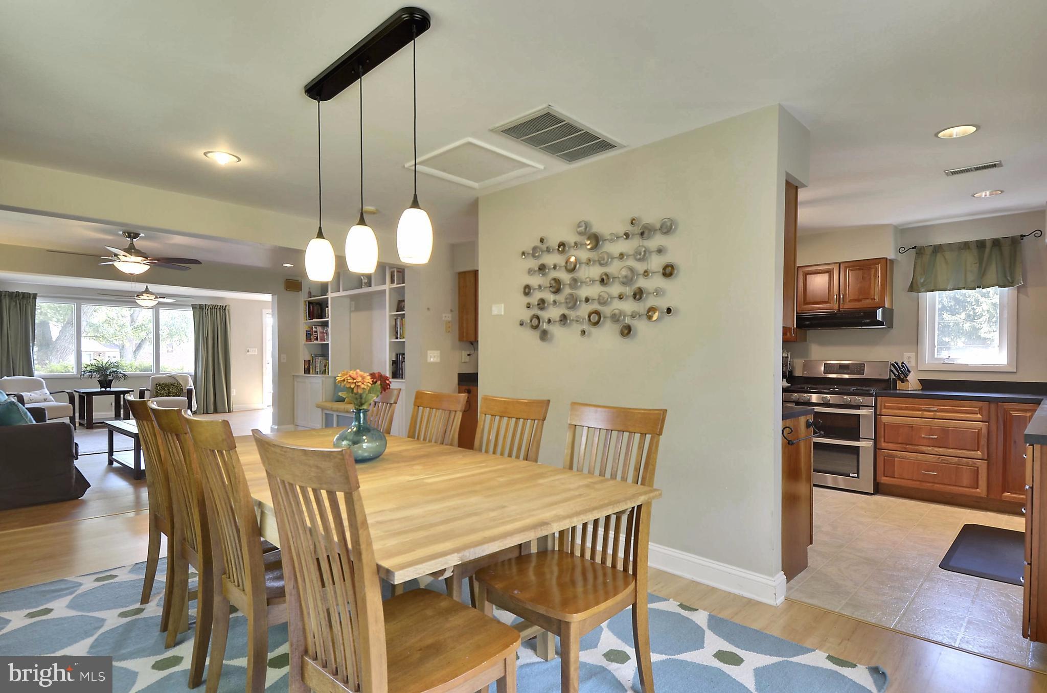 223 Rollingfield Road Catonsville, MD 21228 - Photo 8 of 30 Dining Room has light maple pergo flooring