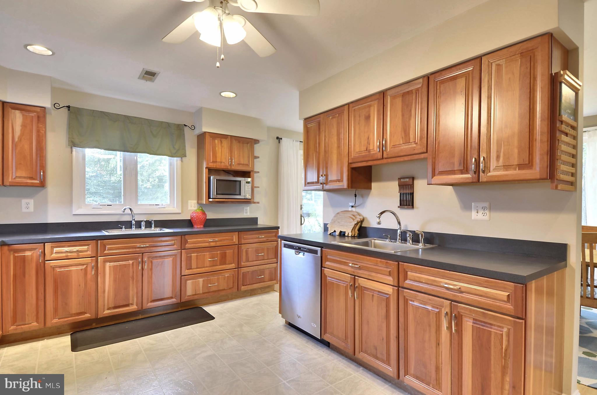 223 Rollingfield Road Catonsville, MD 21228 - Photo 9 of 30 Natural cherry wood cabinetry