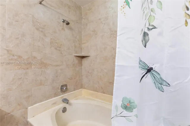 a view of outdoor sitting area with furniture and barbeque area