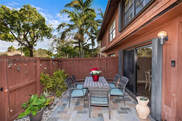 a view of balcony with furniture