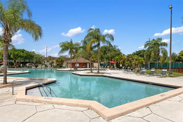 a view of a deck with a backyard