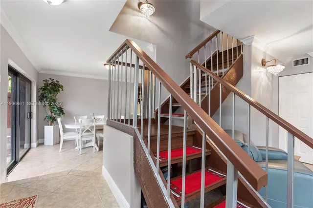 a view of entryway livingroom and hall