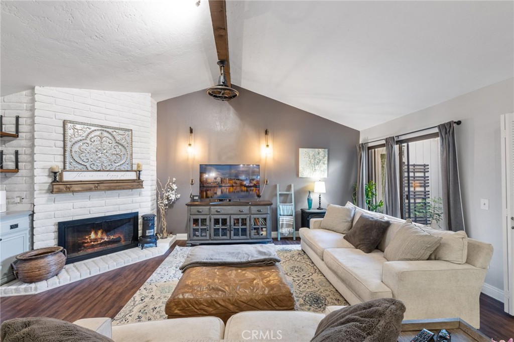 2565 Laramie Road Riverside, CA 92506 - Photo 15 of 46 a living room with furniture and a fireplace