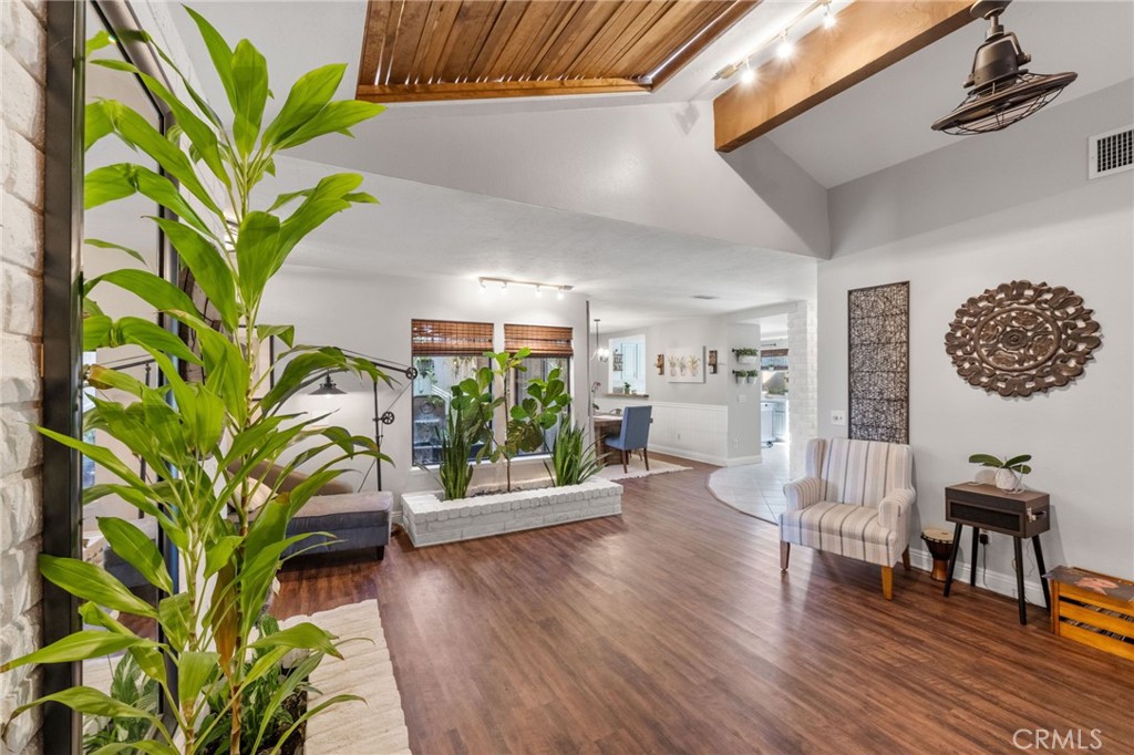 2565 Laramie Road Riverside, CA 92506 - Photo 17 of 46 a living room with furniture and a potted plant