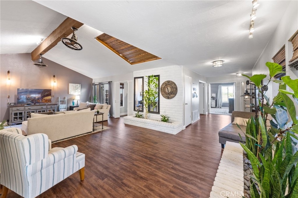 2565 Laramie Road Riverside, CA 92506 - Photo 19 of 46 a living room with furniture and a fireplace