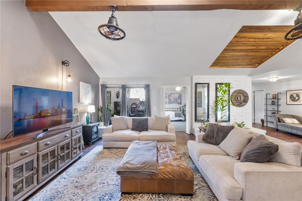 2565 Laramie Road Riverside, CA 92506 - Photo 20 of 46 a living room with furniture kitchen view and large windows