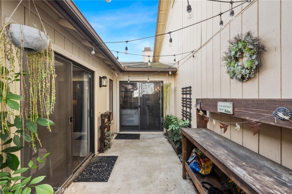 2565 Laramie Road Riverside, CA 92506 - Photo 34 of 46 a view of a patio with table and chairs and potted plants