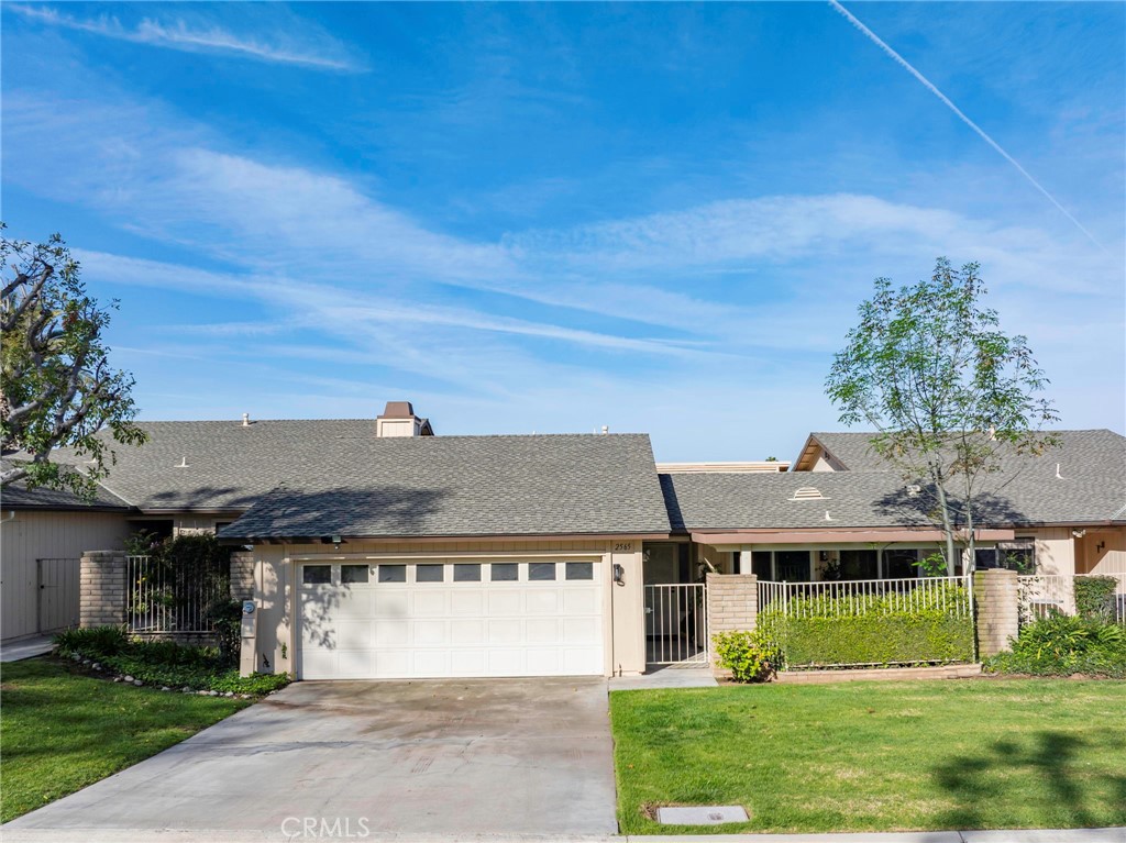 2565 Laramie Road Riverside, CA 92506 - Photo 36 of 46 a front view of a house with a yard