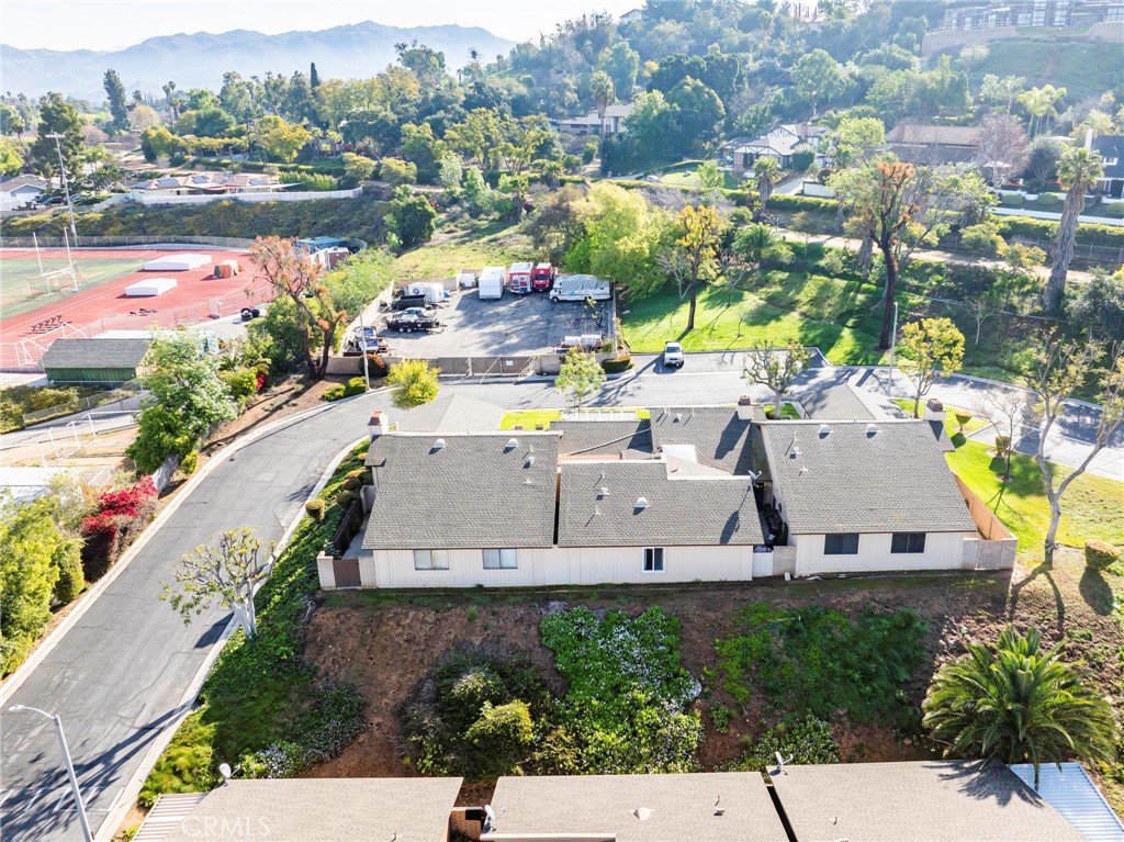 2565 Laramie Road Riverside, CA 92506 - Photo 40 of 46 an aerial view of a house with a garden and lake view