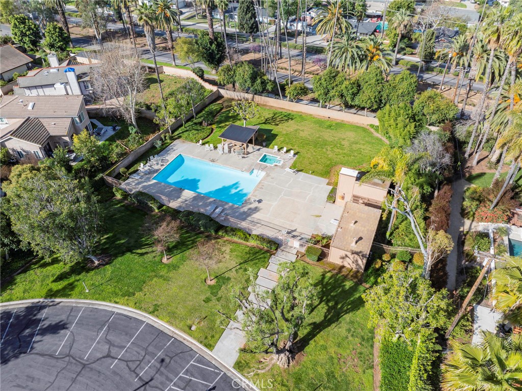 2565 Laramie Road Riverside, CA 92506 - Photo 43 of 46 an aerial view of a house with a garden and swimming pool