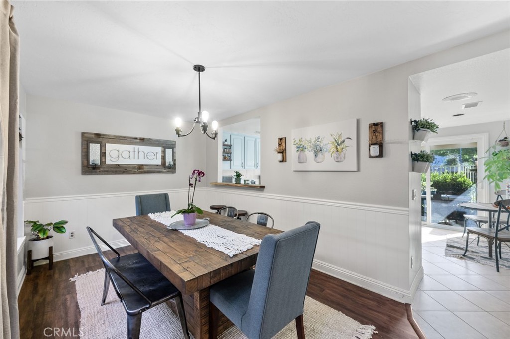 2565 Laramie Road Riverside, CA 92506 - Photo 9 of 46 a view of a dining room with furniture window and wooden floor
