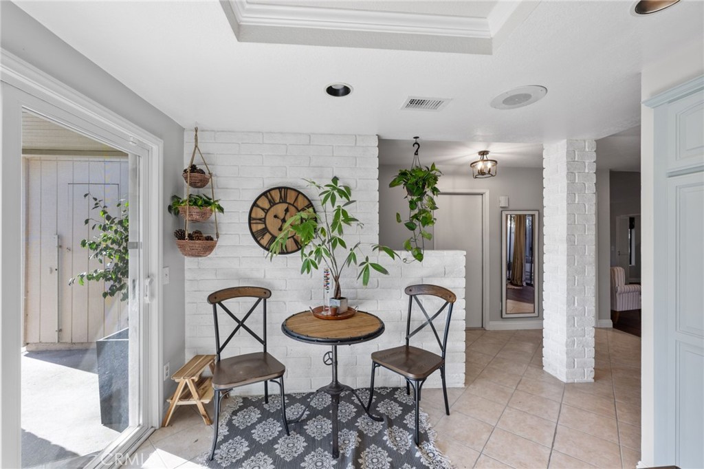 2565 Laramie Road Riverside, CA 92506 - Photo 10 of 46 a view of a dining room with furniture and chandelier
