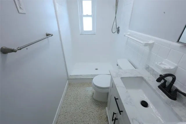 a utility room with washer and dryer