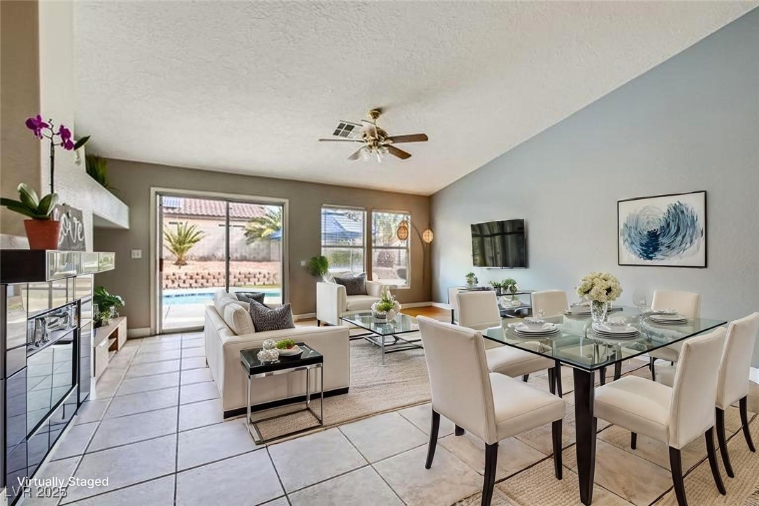 8920 Rusty Rifle Avenue Las Vegas, NV 89143 - Photo 14 of 37 Family room with virtually staged furniture to show as a family room and dining area.