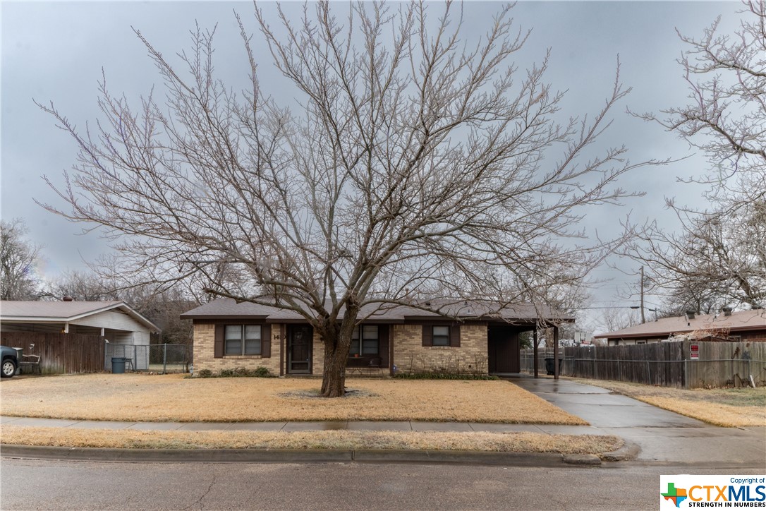 a house with trees in front of it