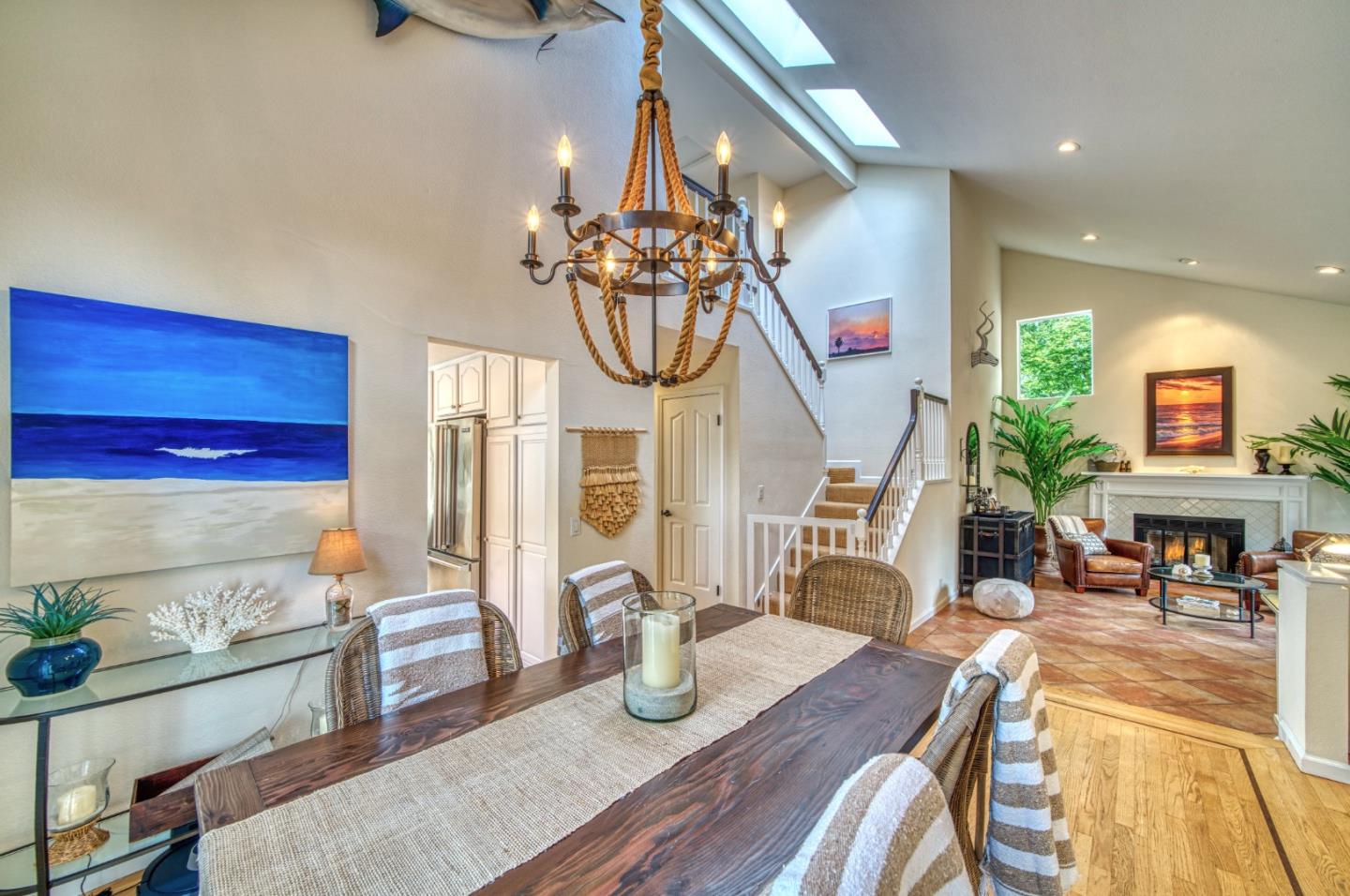 388 Greenbrier Road Half Moon Bay, CA 94019 - Photo 12 of 46 a living room with furniture a dining table and chairs with wooden floor