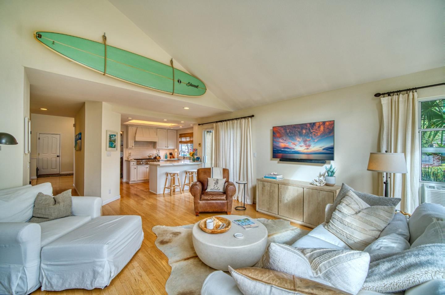 388 Greenbrier Road Half Moon Bay, CA 94019 - Photo 18 of 46 a living room with furniture and a flat screen tv