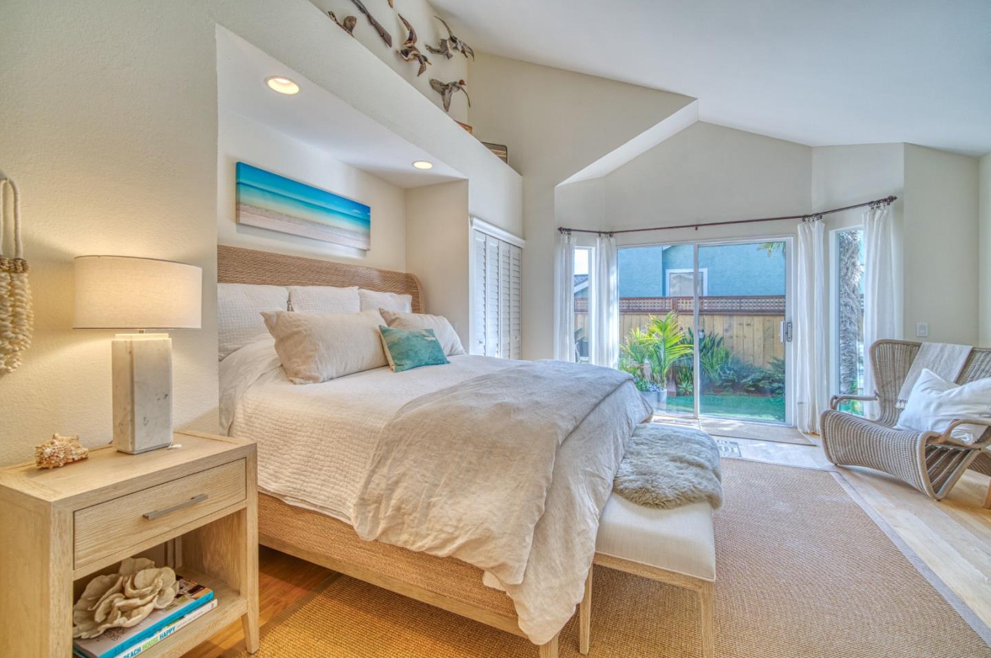 388 Greenbrier Road Half Moon Bay, CA 94019 - Photo 23 of 46 a bedroom with a bed and large window