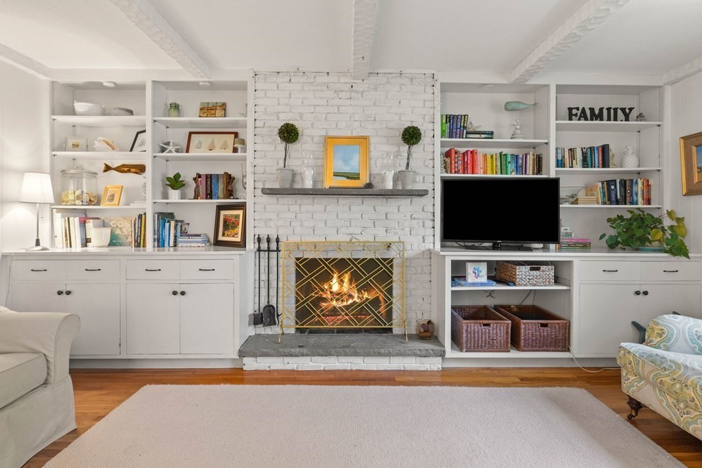 44 Crestwood Road Marblehead, MA 01945 - Photo 11 of 42 a living room with furniture and a flat screen tv