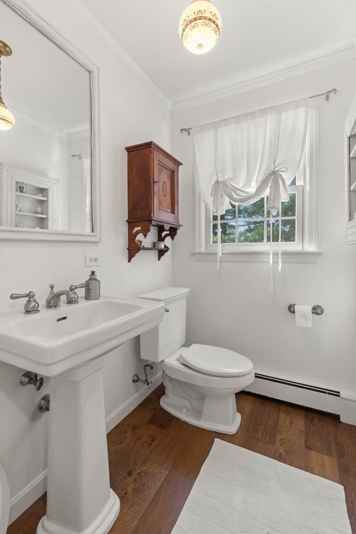 44 Crestwood Road Marblehead, MA 01945 - Photo 20 of 42 a bathroom with a sink toilet and mirror