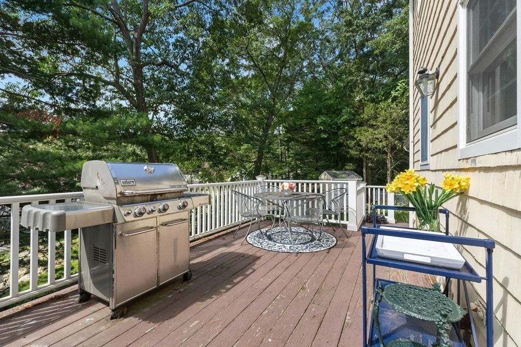 44 Crestwood Road Marblehead, MA 01945 - Photo 39 of 42 a view of a chair and table on the wooden deck