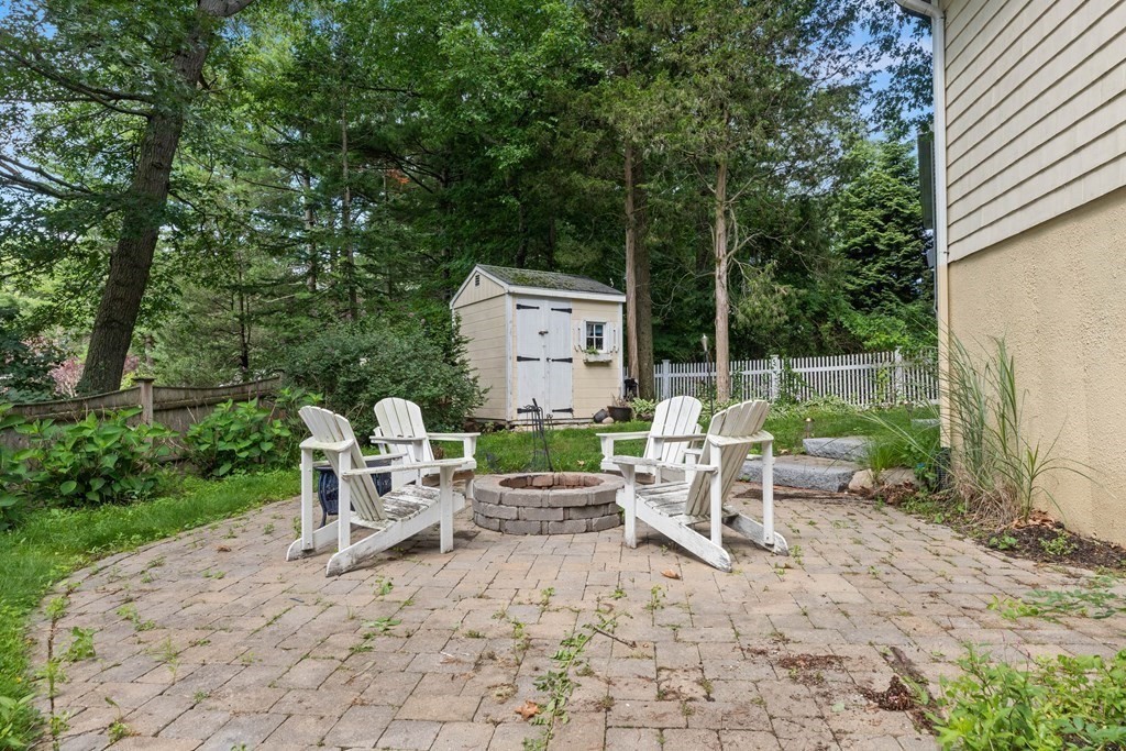 44 Crestwood Road Marblehead, MA 01945 - Photo 41 of 42 a view of a chairs and table in backyard