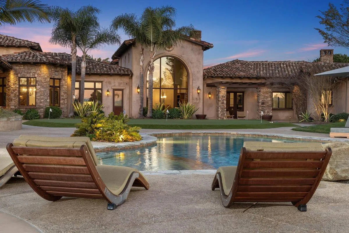 14778 El Rodeo Court Rancho Santa Fe, CA 92067 - Photo 22 of 29 front view of a house with a garden