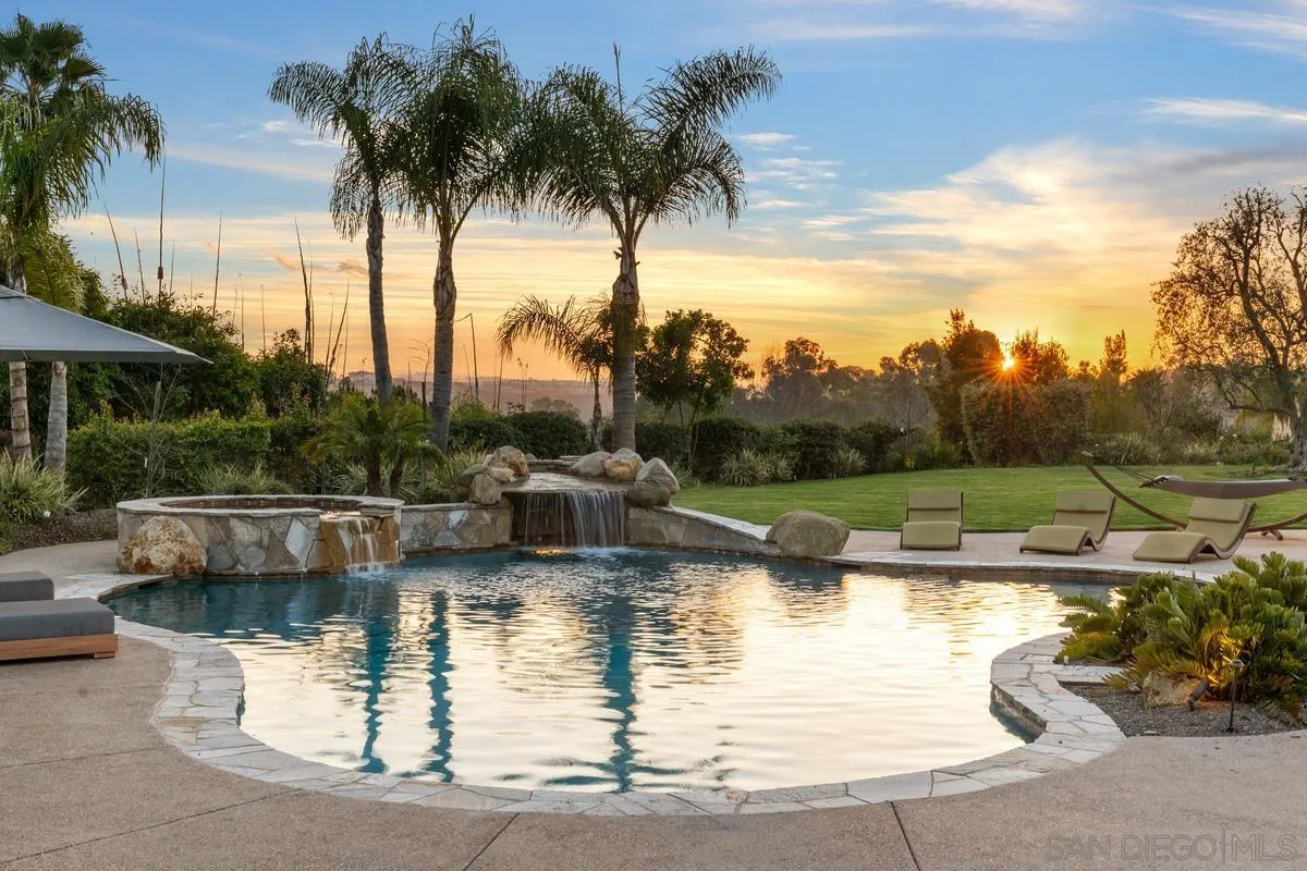 14778 El Rodeo Court Rancho Santa Fe, CA 92067 - Photo 25 of 29 a view of water with palm trees