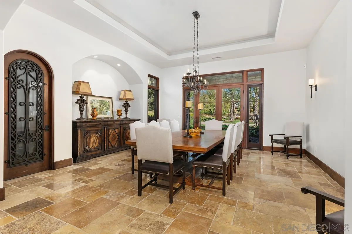14778 El Rodeo Court Rancho Santa Fe, CA 92067 - Photo 7 of 29 a view of a dining room with furniture