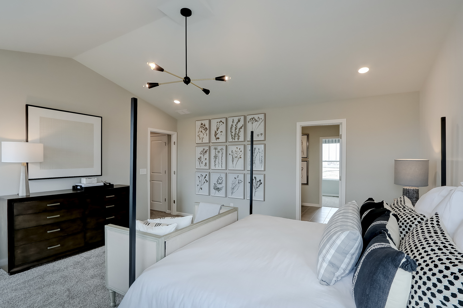 612 Endicott Road South Elgin, IL 60177 - Photo 20 of 30 a bedroom with a bed a dresser and flat screen tv