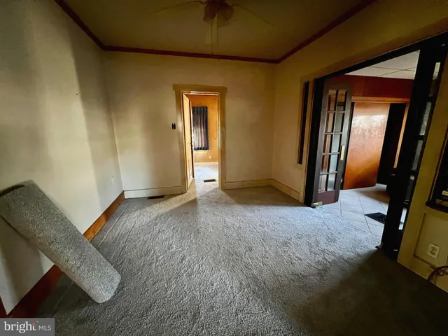 a view of livingroom with furniture and a window