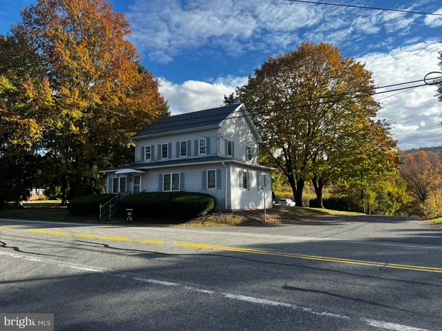 a view of street with houses
