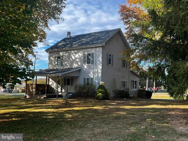 a view of a house with a swimming pool
