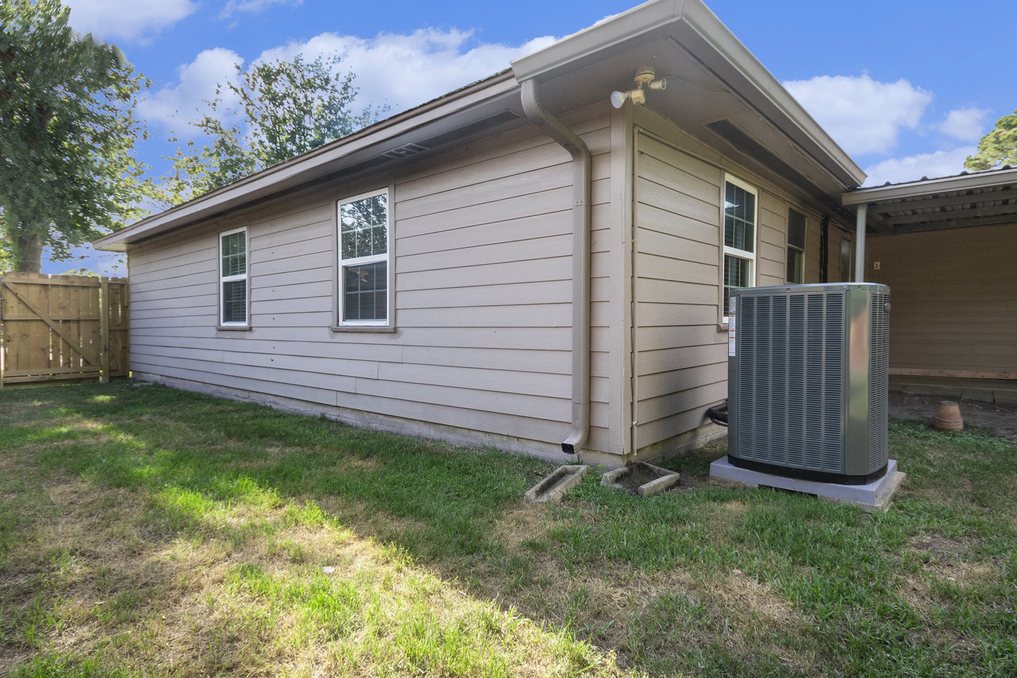 10619 Wheaton Drive Houston, TX 77089 - Photo 23 of 25 Charming single-story home featuring a spacious fenced backyard, perfect for outdoor activities.
