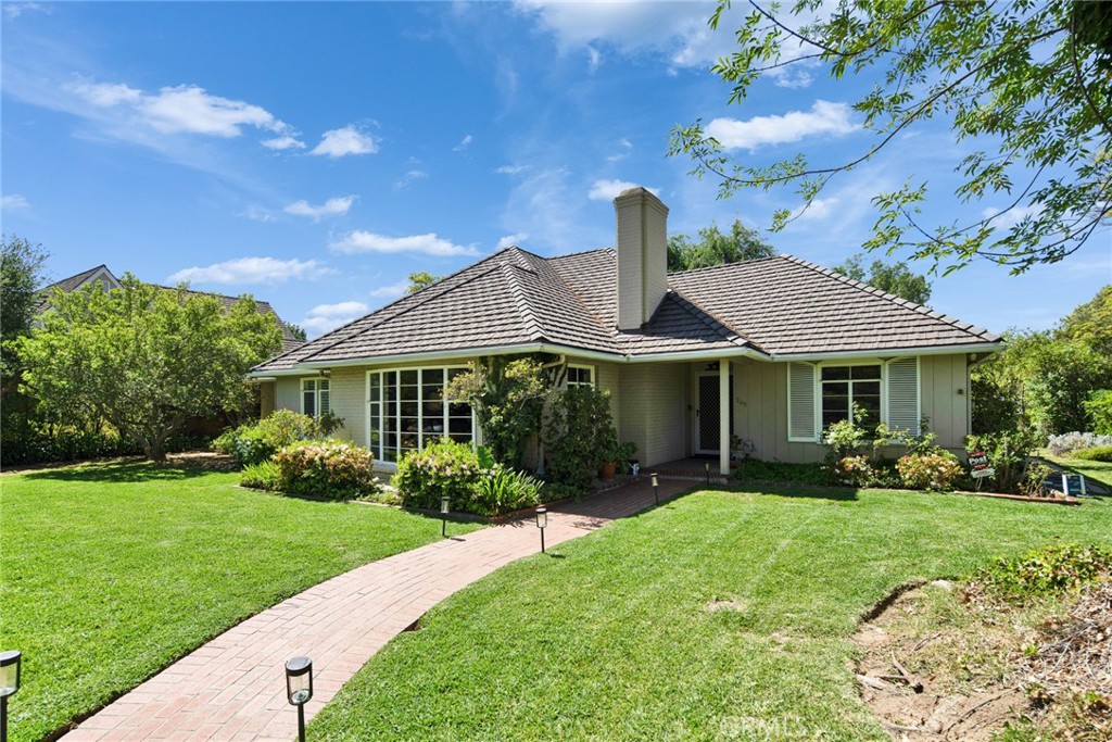 705 Chaucer Road San Marino, CA 91108 - Photo 1 of 35 a front view of a house with garden