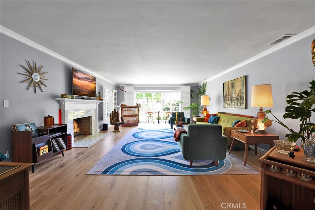 705 Chaucer Road San Marino, CA 91108 - Photo 11 of 35 a living room with fireplace furniture and flat screen tv