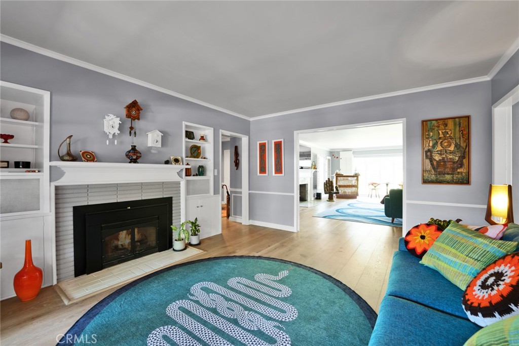 705 Chaucer Road San Marino, CA 91108 - Photo 12 of 35 a living room with furniture and a fireplace