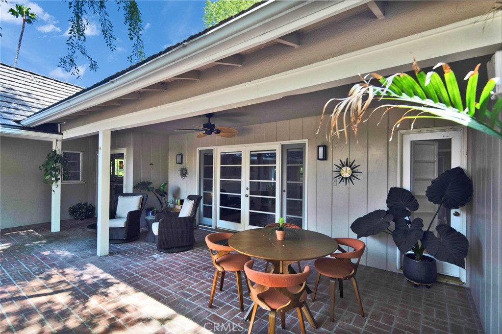 705 Chaucer Road San Marino, CA 91108 - Photo 32 of 35 a dinning table and chairs in patio of the house