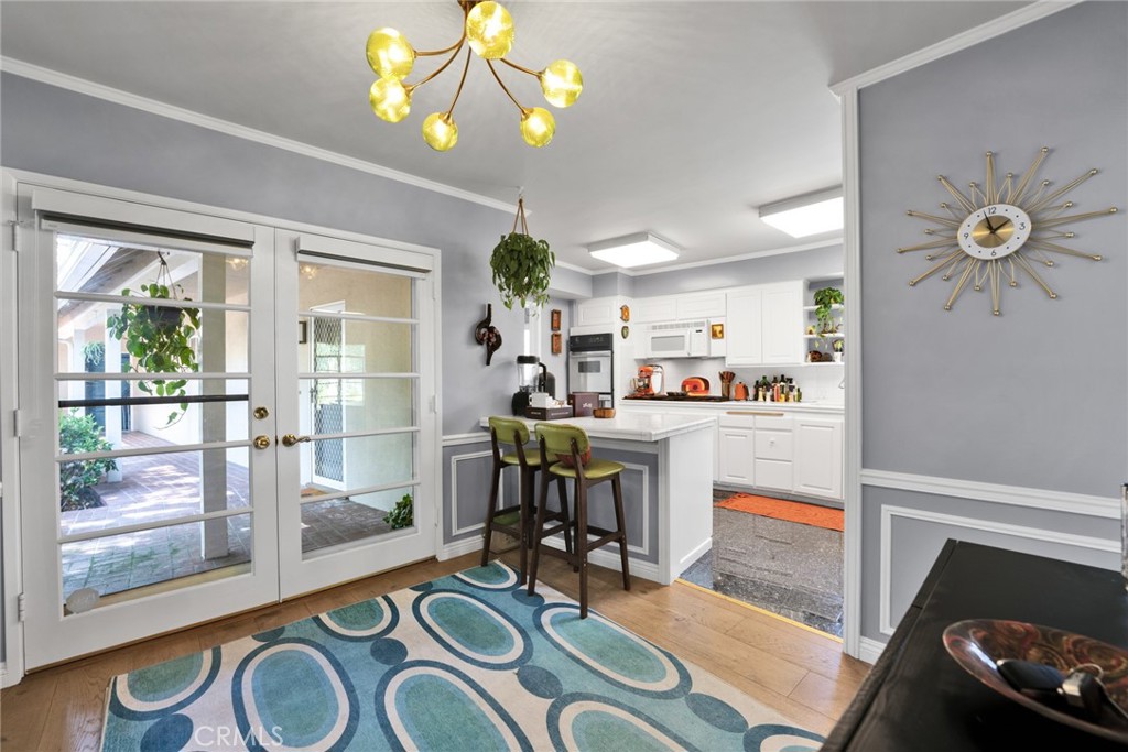 705 Chaucer Road San Marino, CA 91108 - Photo 5 of 35 a view of kitchen and dining area with furniture