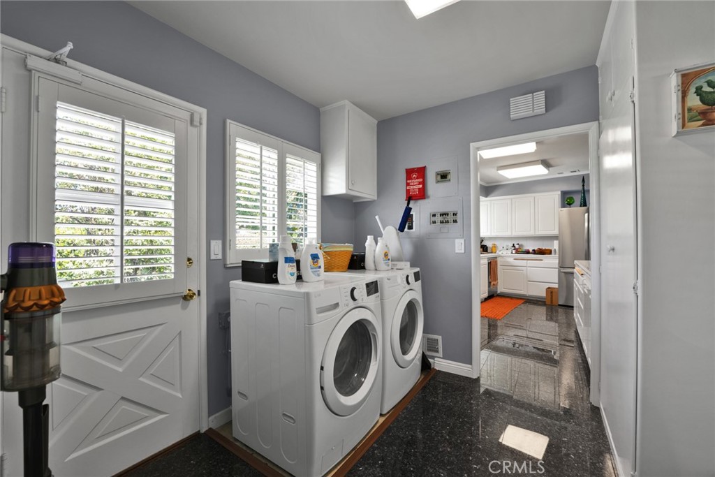 705 Chaucer Road San Marino, CA 91108 - Photo 8 of 35 a view of kitchen and washer and dryer