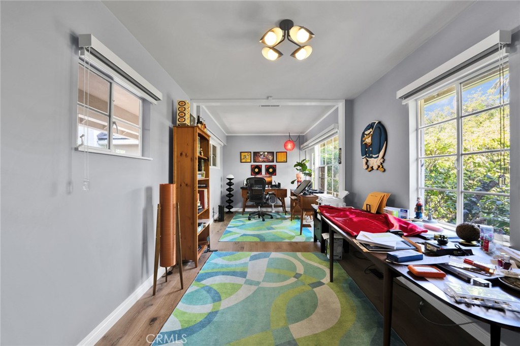 705 Chaucer Road San Marino, CA 91108 - Photo 9 of 35 a room with musical instrument pool table and windows