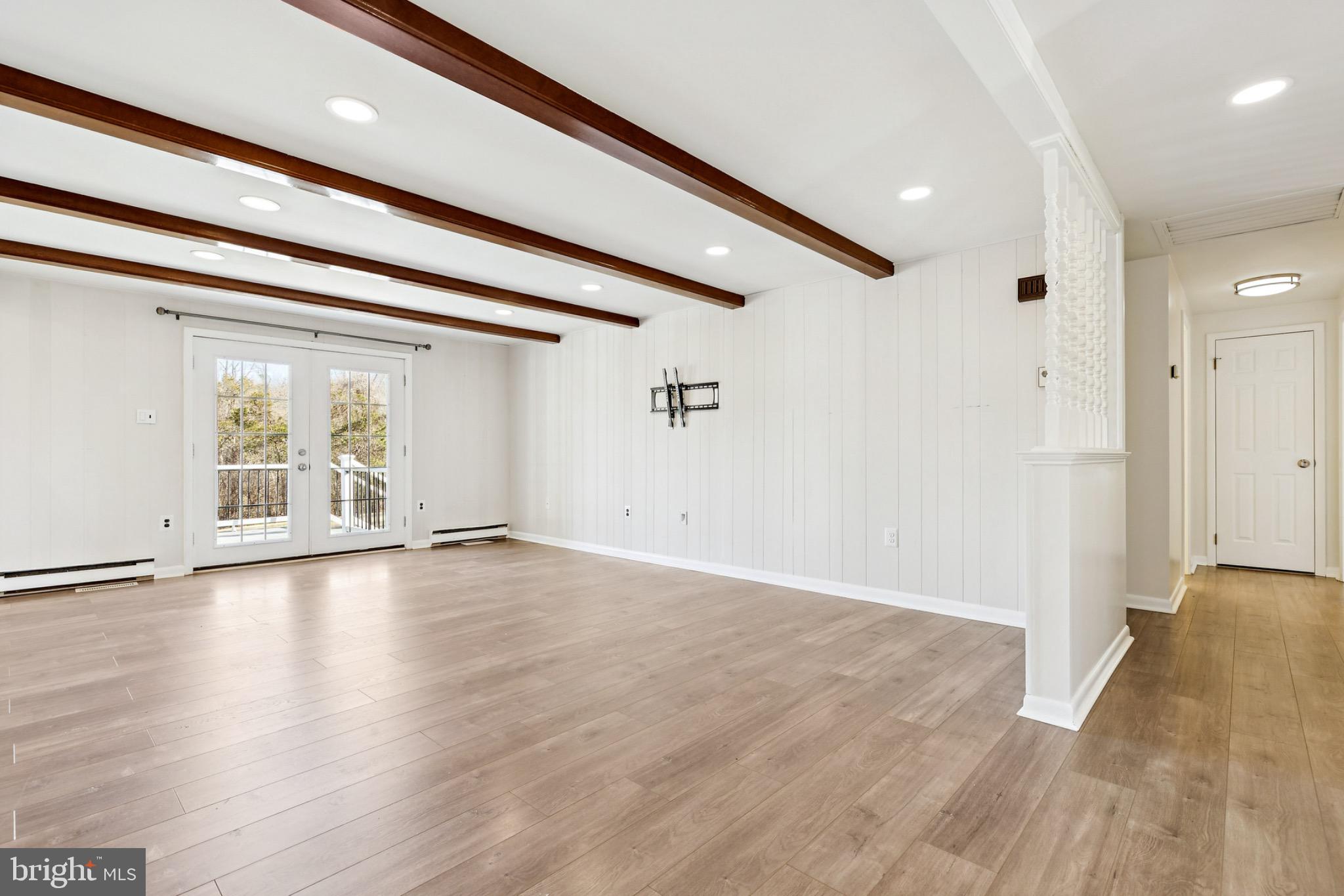 6127 Beverleys Mill Road Broad Run, VA 20137 - Photo 12 of 28 Bright and airy family room with charming beams.